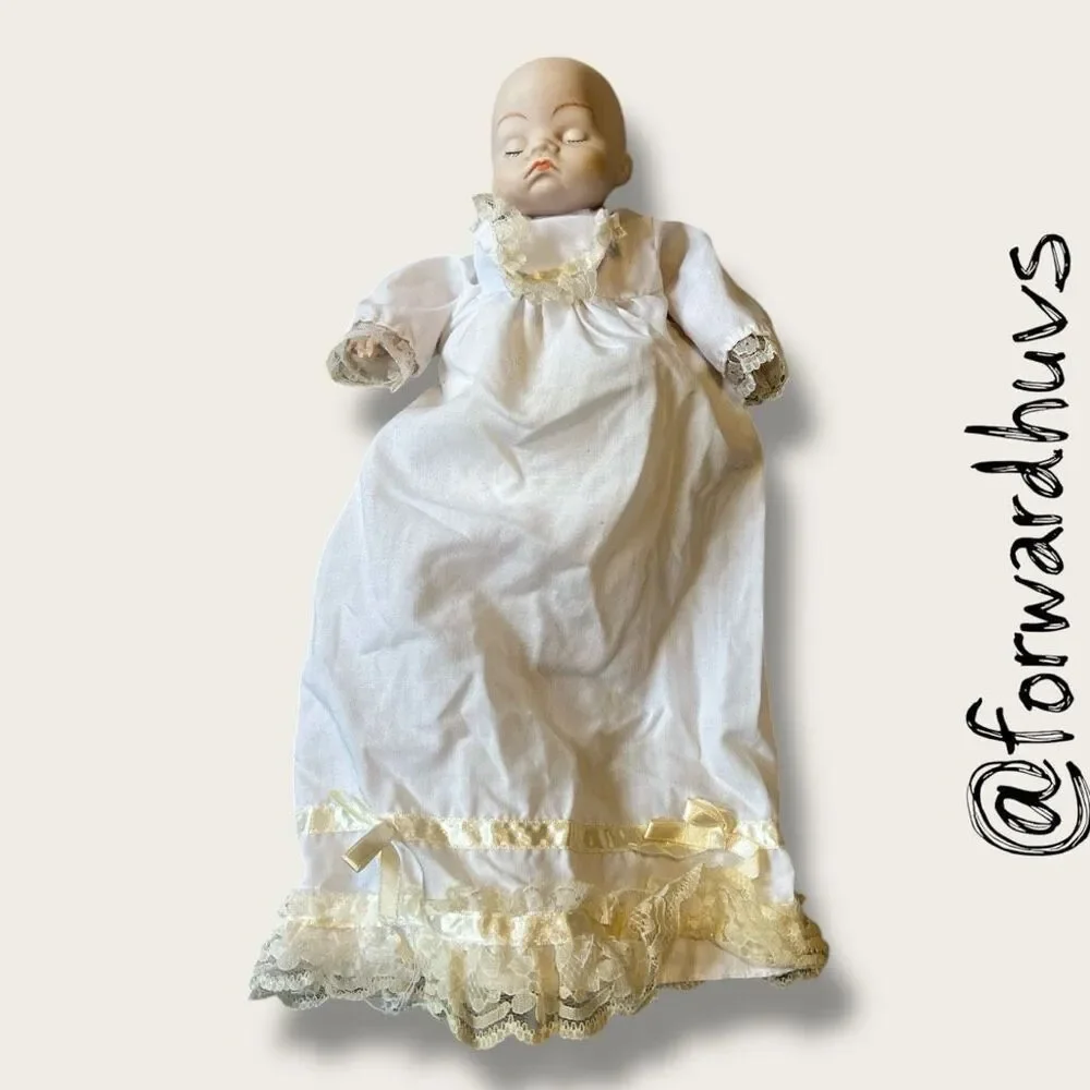 Wind-Up Musical Porcelain Doll – Moving Head & Arms - UNKNOWN AGE